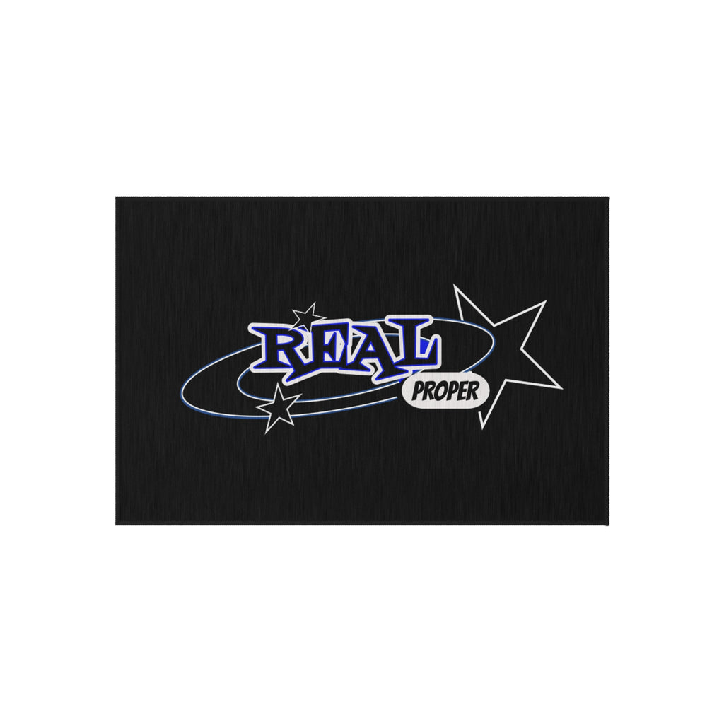 "Real Proper" Star Outdoor Rug — Black Graphic Doormat