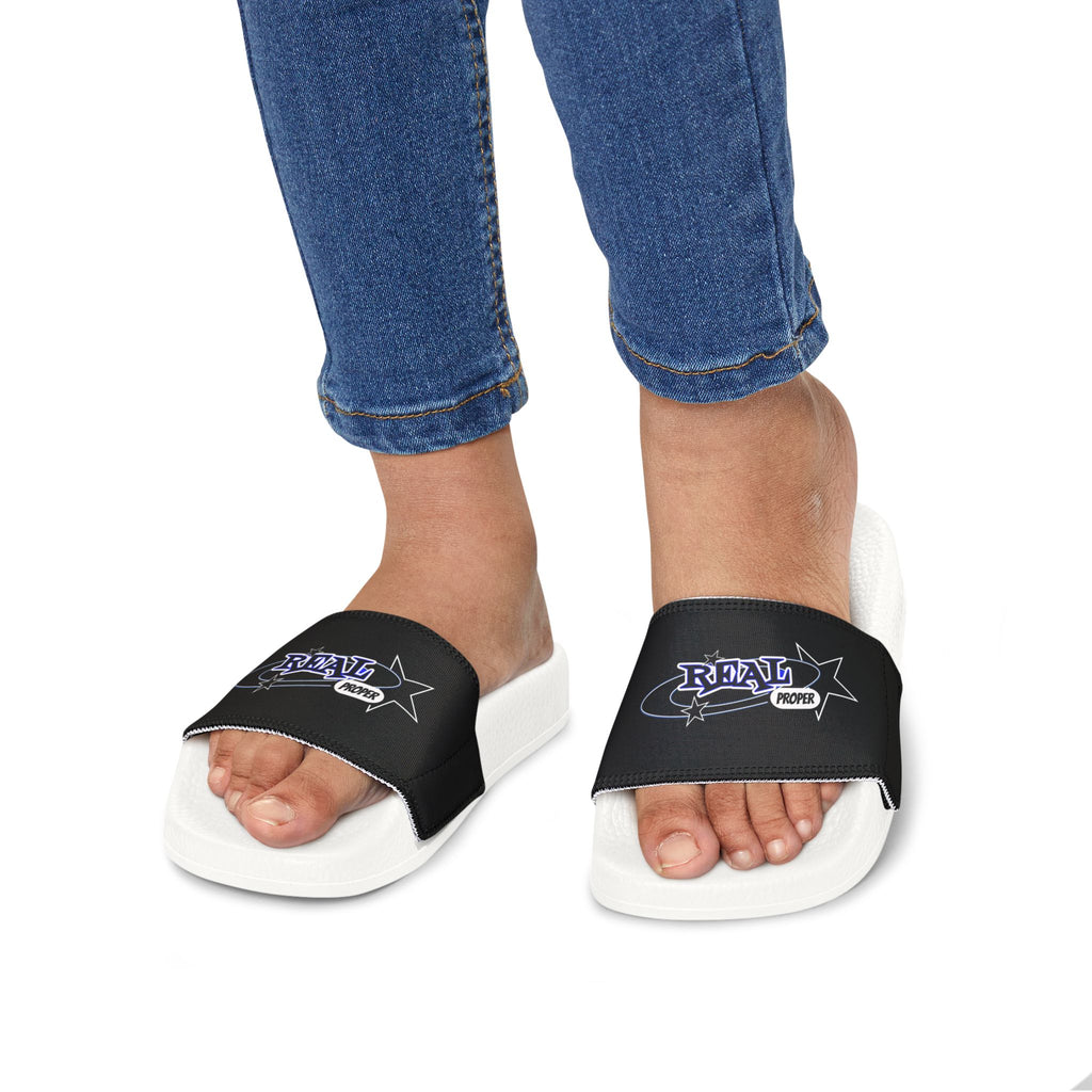 Youth Slide Sandals — Black Removable-Strap Slides with 'Real Proper' Graphic